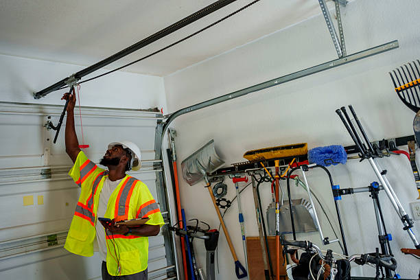 Professional Garage Door Panel Replacement technician working in Warren, IN